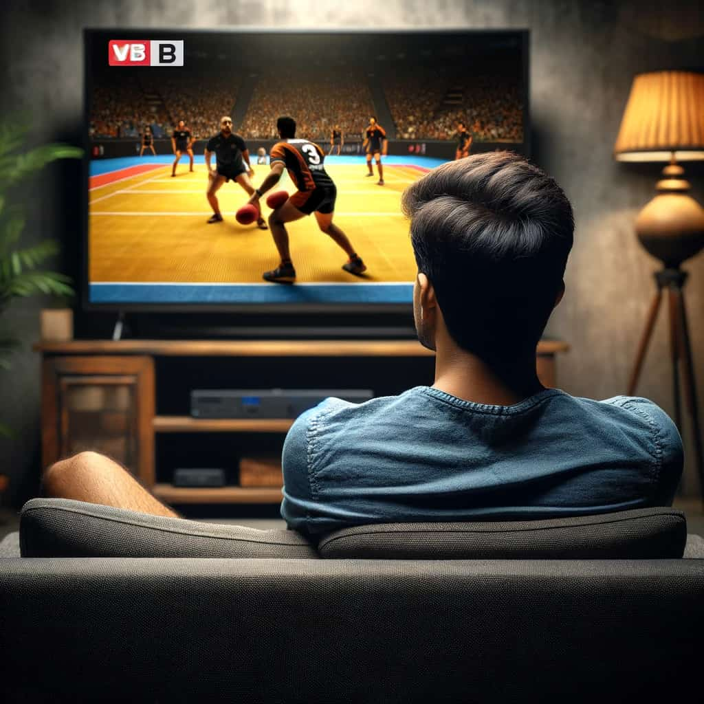 Young Indian Man watching Kabaddi on TV