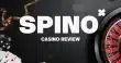 Spino casino review banner featuring the SpinO logo, roulette wheel, poker chips and playing cards on a dark premium casino background